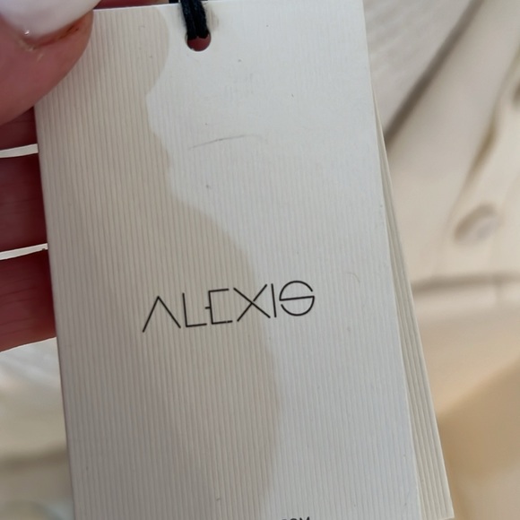 Alexis Larenz Flare-leg Side-button Cropped Pants In White - Picture 7 of 7